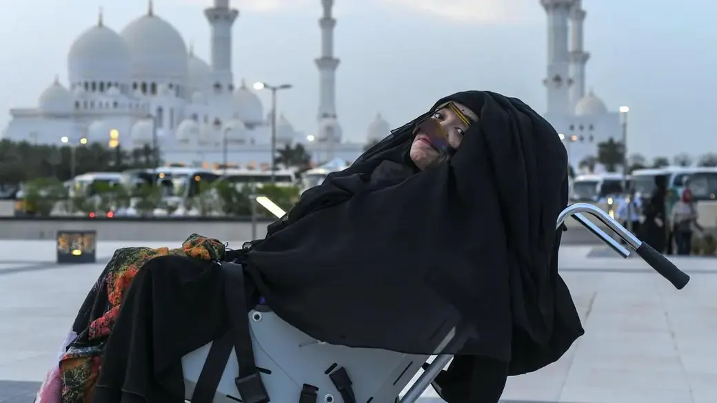 Munira Abdulla, awakened from a 27-year-long vegetative state, at Sheikh Zayed Grand Mosque. Khushnum Bhandari for The National