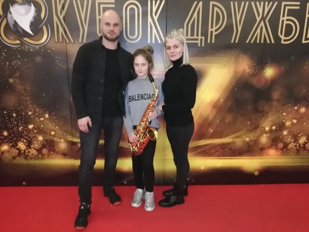 София Гриневич с родителями. Фото их семейного архива.