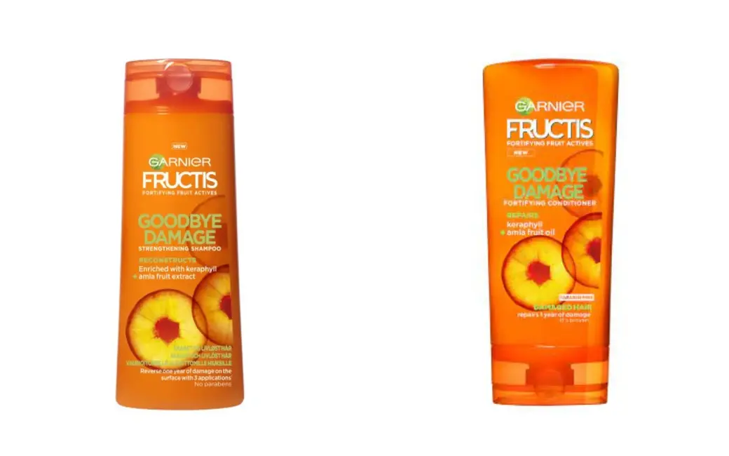 Шампунь Garnier Fructis «Goodbye Damage» – слева. Кондиционер Garnier Fructis «Goodbye Damage» – справа.